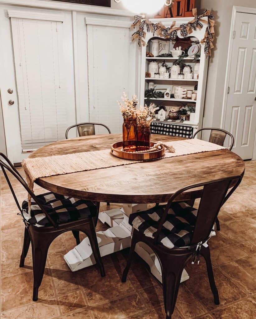 Chunky Farmhouse Dining Table With Woven Runner and Centerpiece