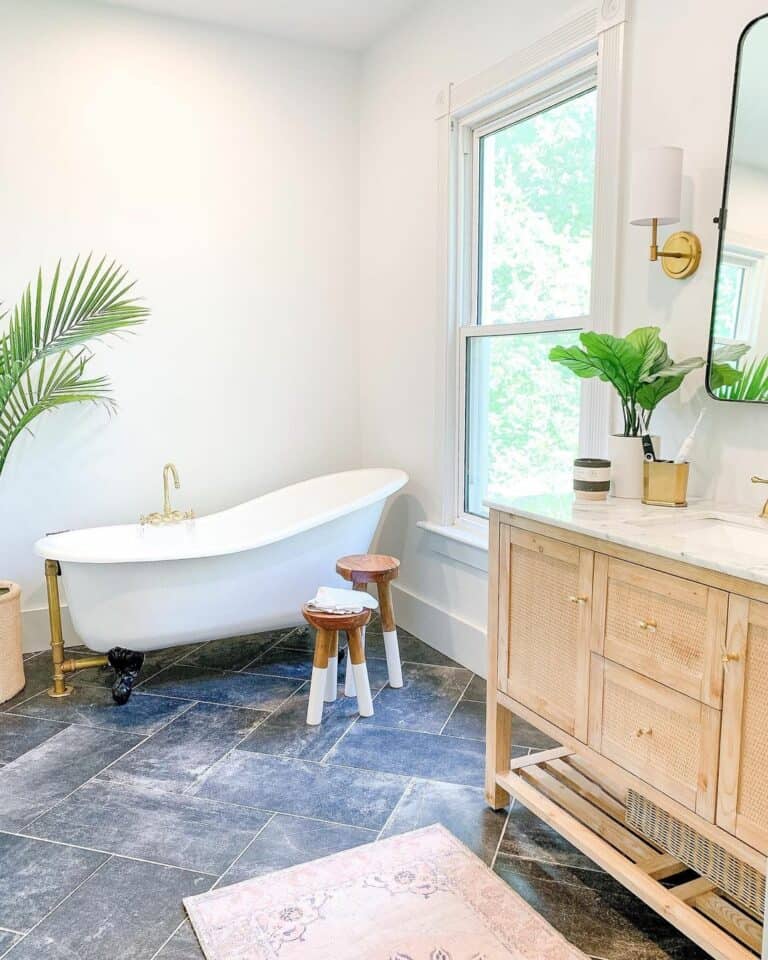 Clawfoot Tub With Wood and White Bathroom Stools