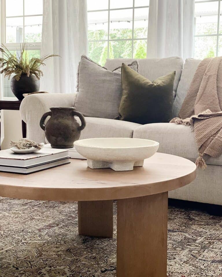 Clay Vessels on a Round Wooden Coffee Table