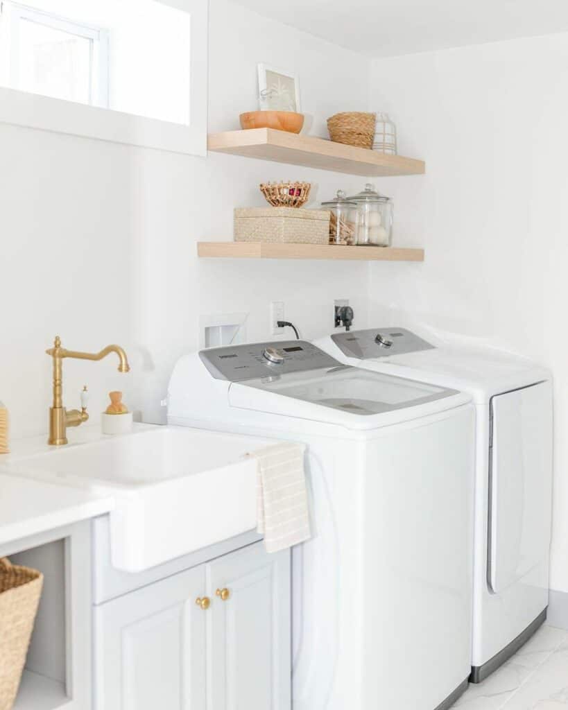 Clean and Elegant Laundry Room with a Sink