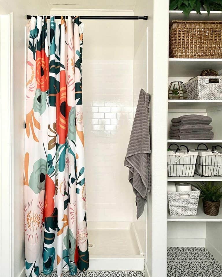 Colorful Shower Curtain and White Subway Tile Walls