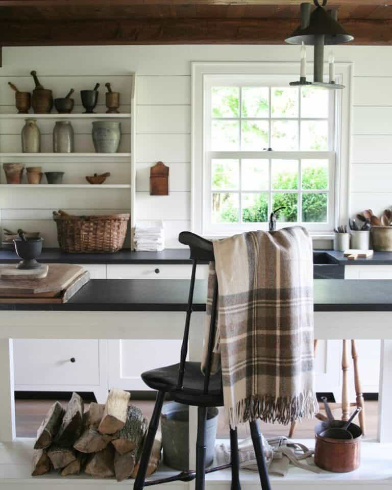 Country Kitchen With White and Black Island