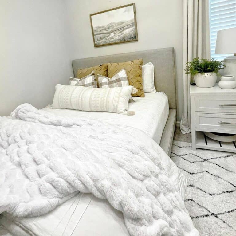 Cozy Guest Bedroom With Throw Blankets