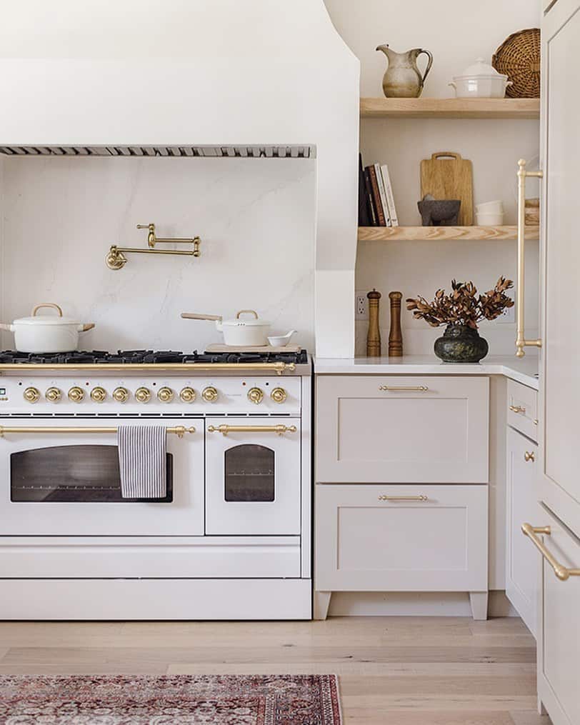 Cream-Beige Kitchen Cabinets and Gold Hardware