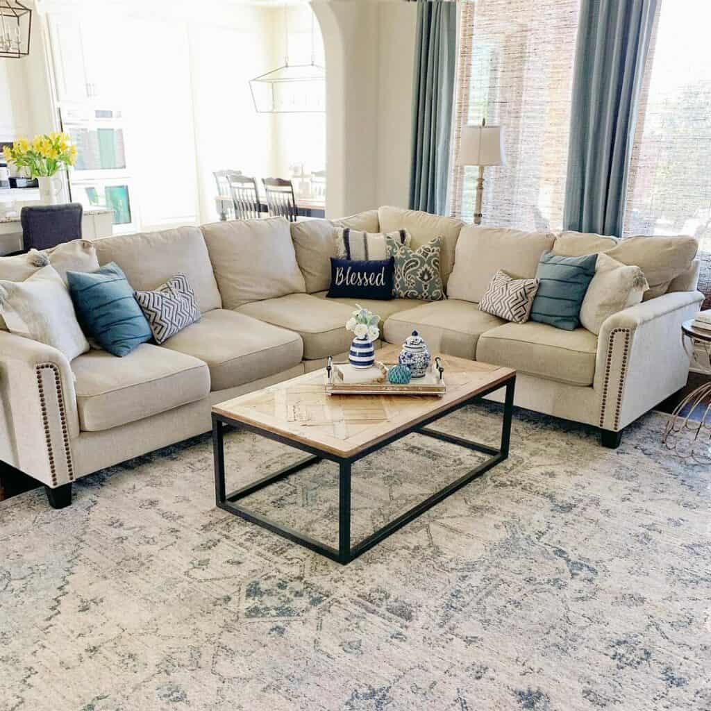 Cream and Blue Living Room With Marble-topped Table