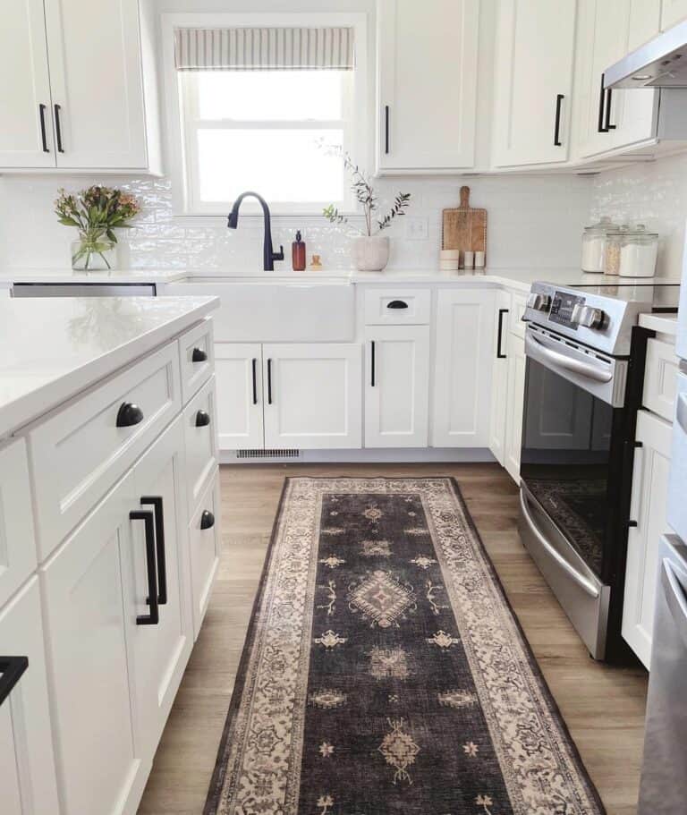 https://www.soulandlane.com/wp-content/uploads/2023/01/Creating-a-Balanced-Look-With-Dark-Kitchen-Rug-768x911.jpg