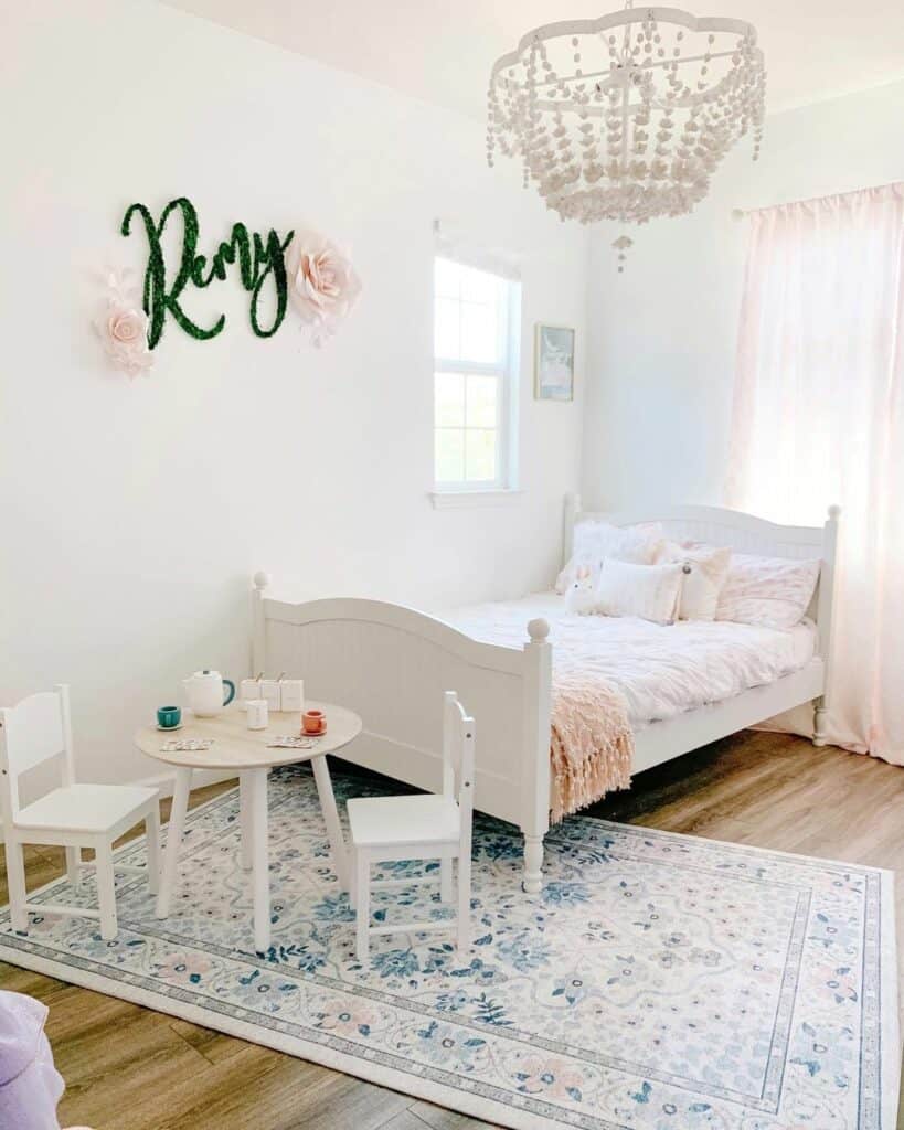 Delightful Girl Toddler Bedroom with Beaded Chandelier