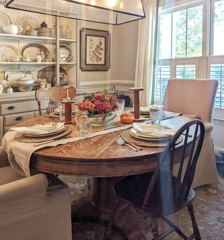 Dining Table with Floral Centerpiece