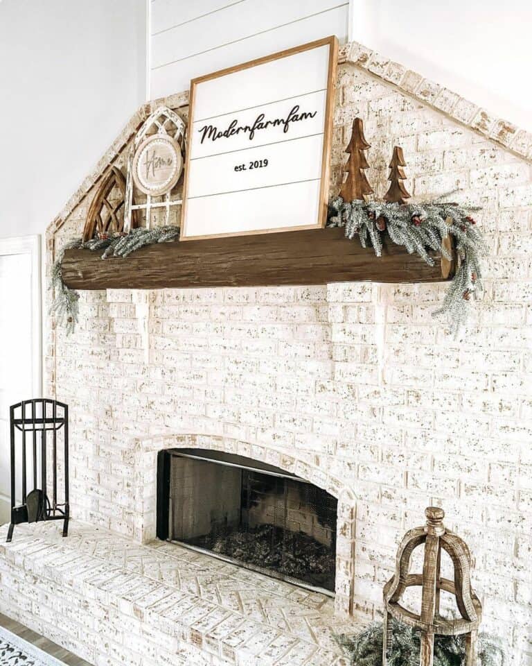 Distressed Brick Fireplace with Brown Wood Mantel