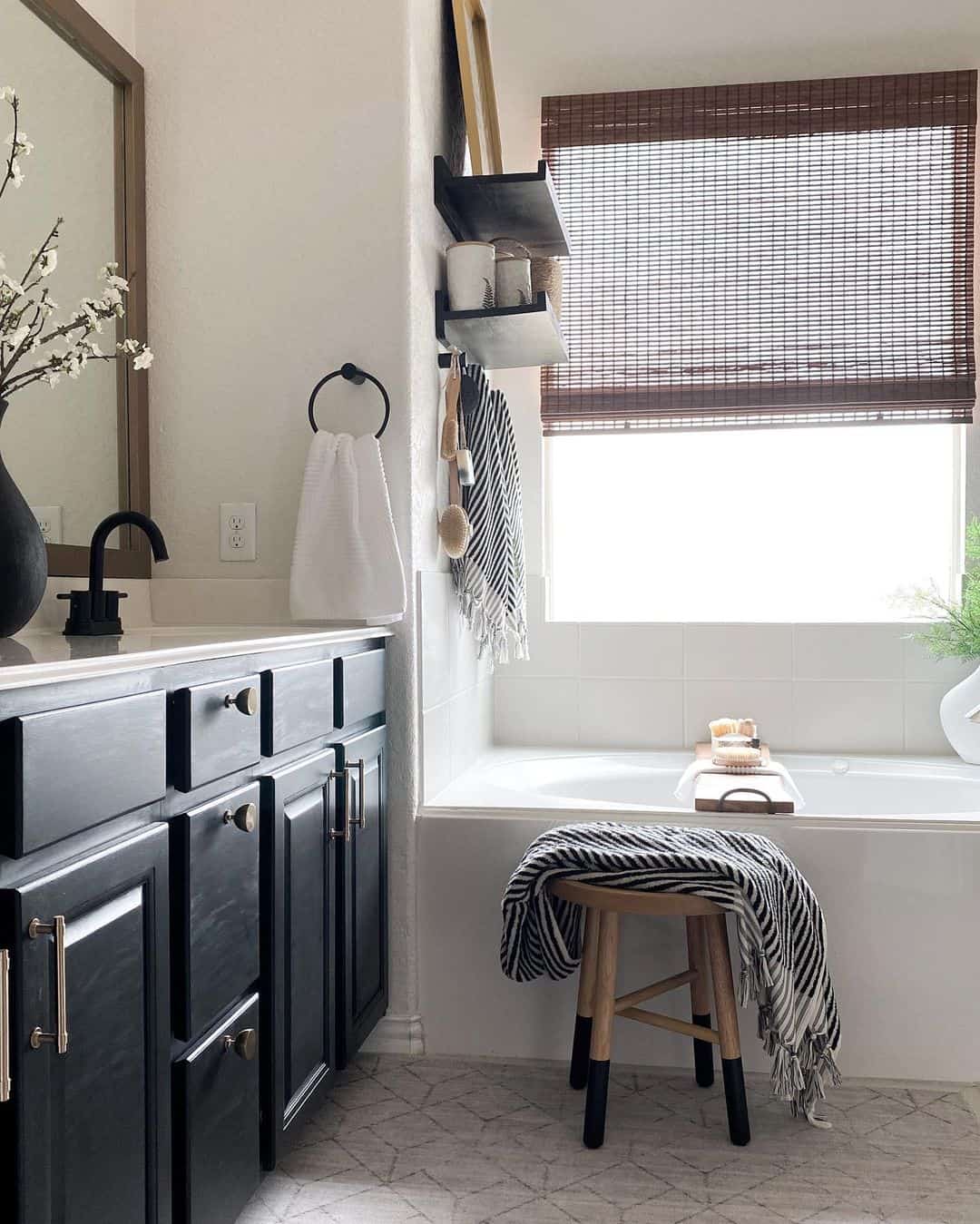 Dropin Bathtub With Light Wood and Black Stool Soul & Lane