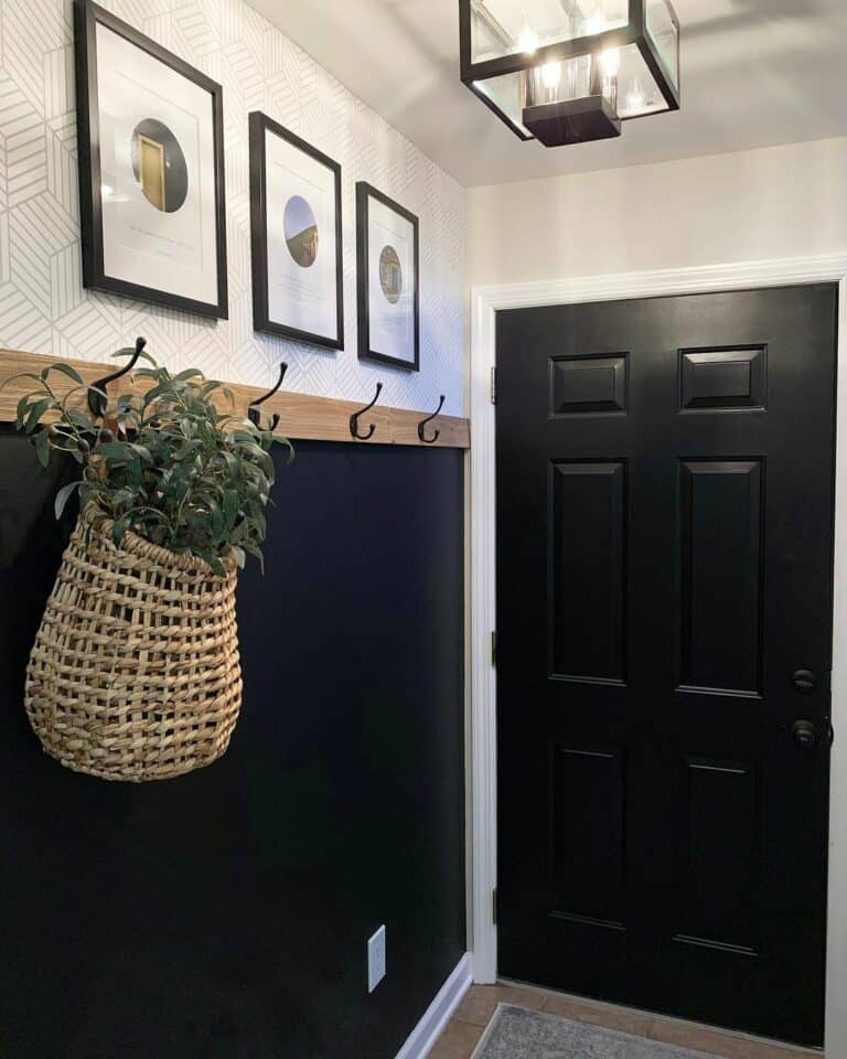 Entryway with Black Framed Artwork