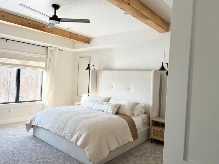 Exposed Ceiling Beams in a White Bedroom