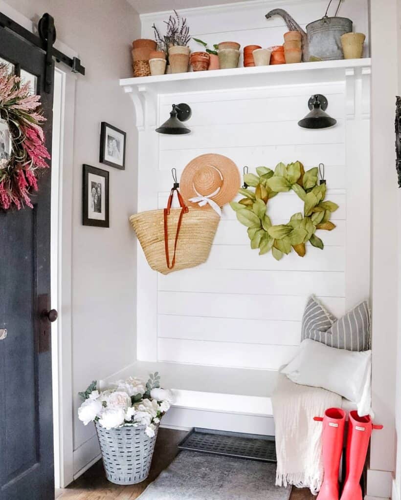 Farmhouse Entryway With Shiplap Paneling
