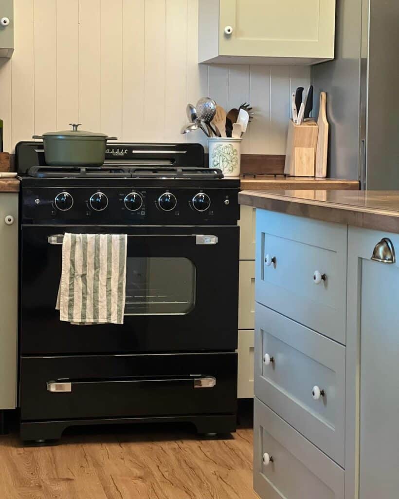 Farmhouse Grey Kitchen Cabinets with Black Range