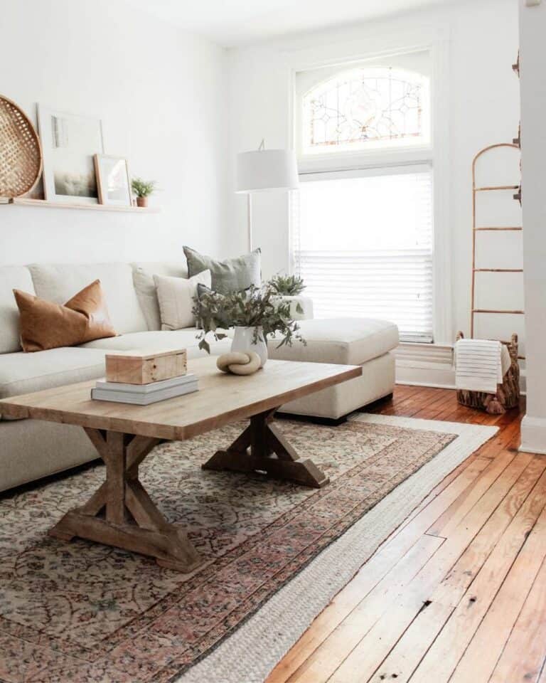 Farmhouse Living Room With Layered Rugs
