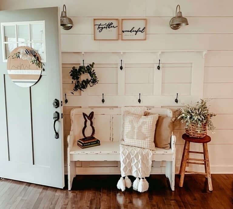 Farmhouse-styled Entryway With Bronze Pendant Lighting