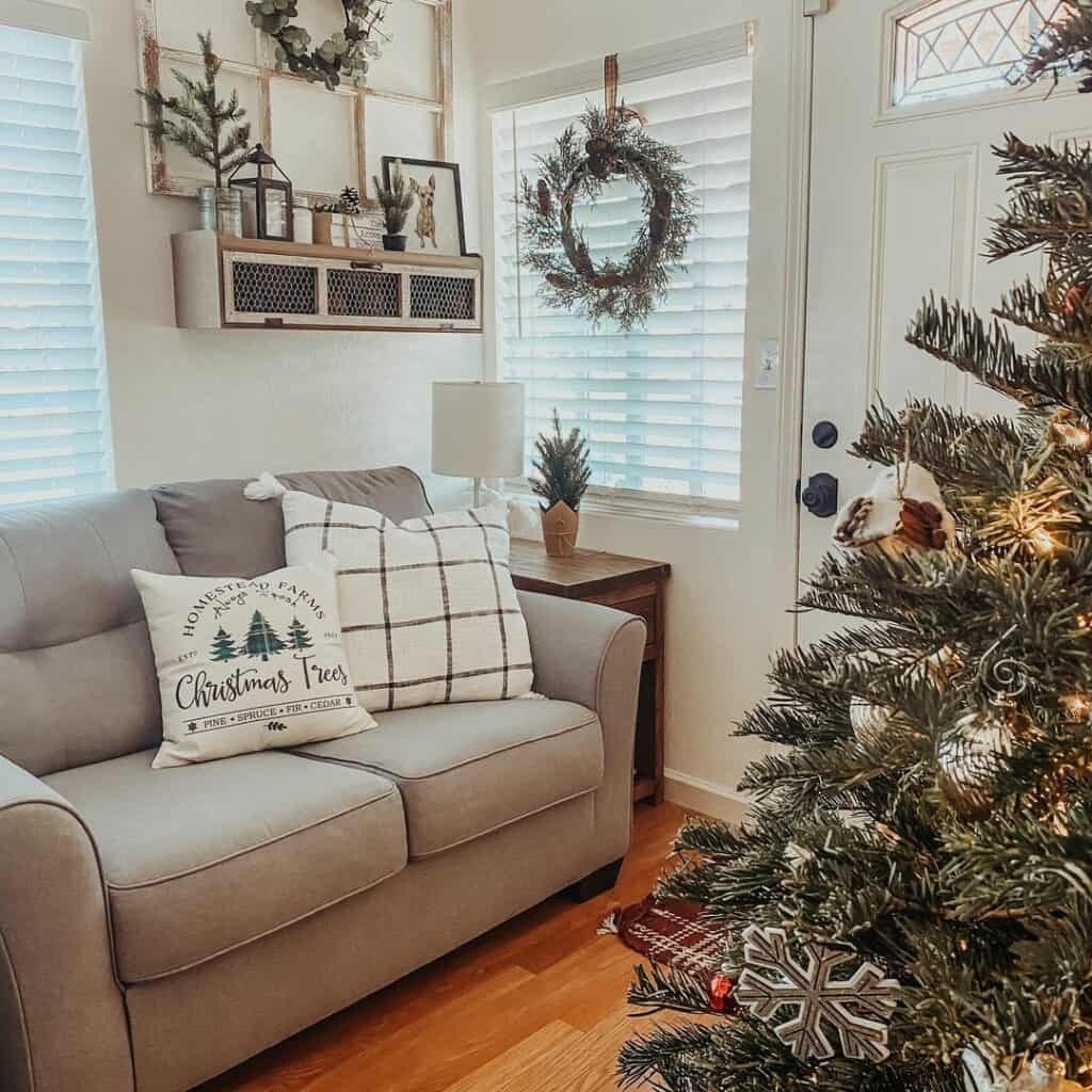 Festive Entranceway with Gray Loveseat