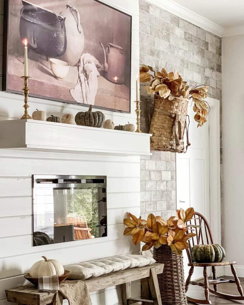 Fireplace With Shiplap Paneling and Fall Décor