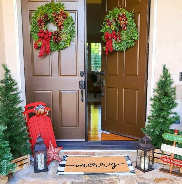 Front Door Wreaths With Pinecones and Red Plaid Ribbon
