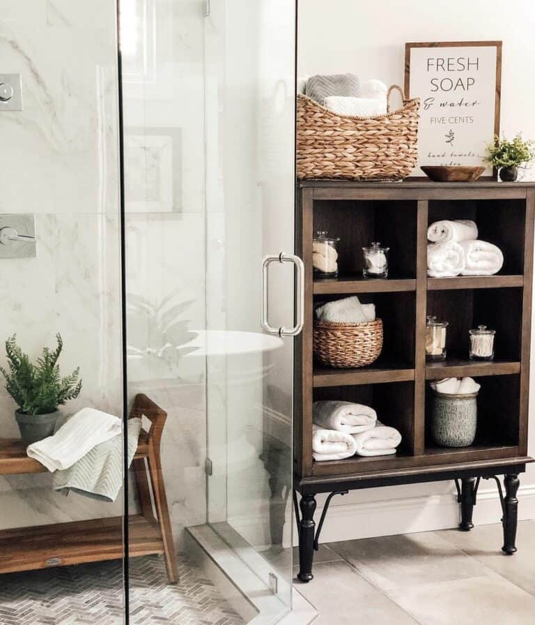 Glass Shower with Dark Wood Accents