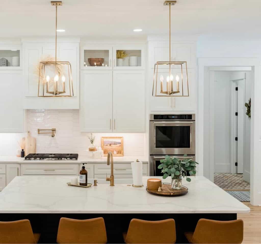 Gold Lantern Lamps Over Kitchen Island