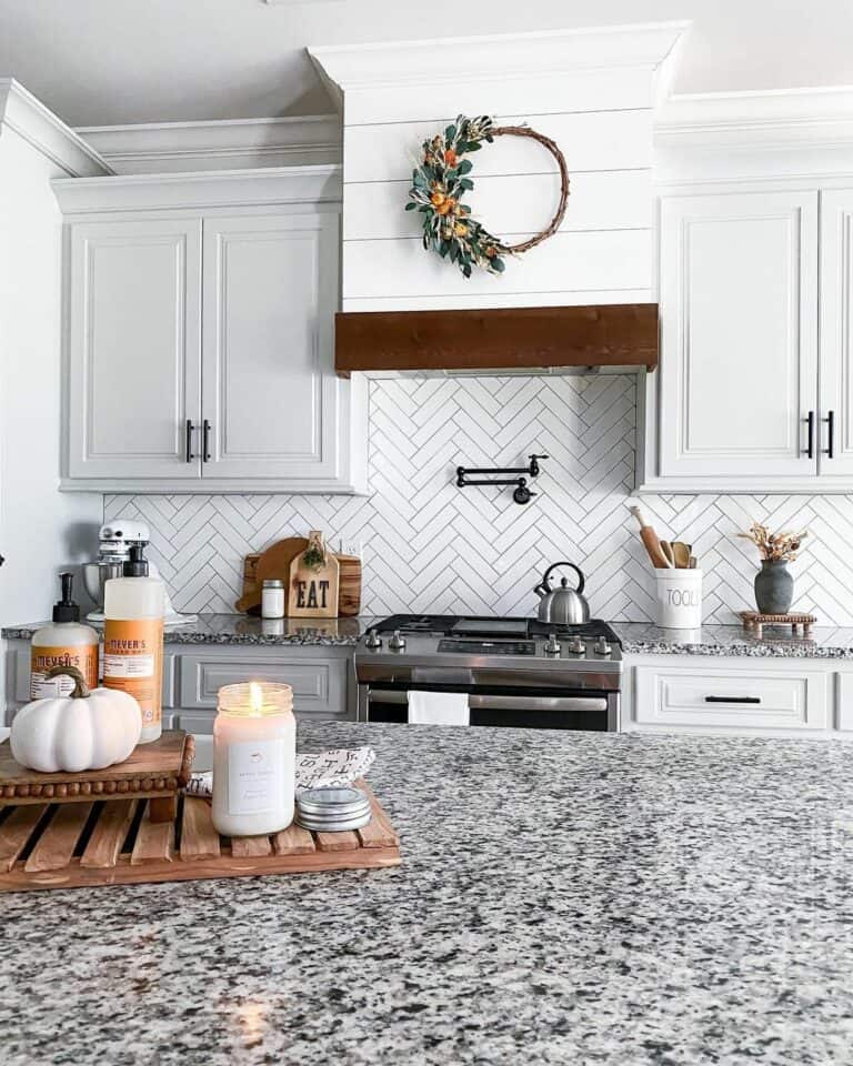 Gray Counter With Herringbone Backsplash