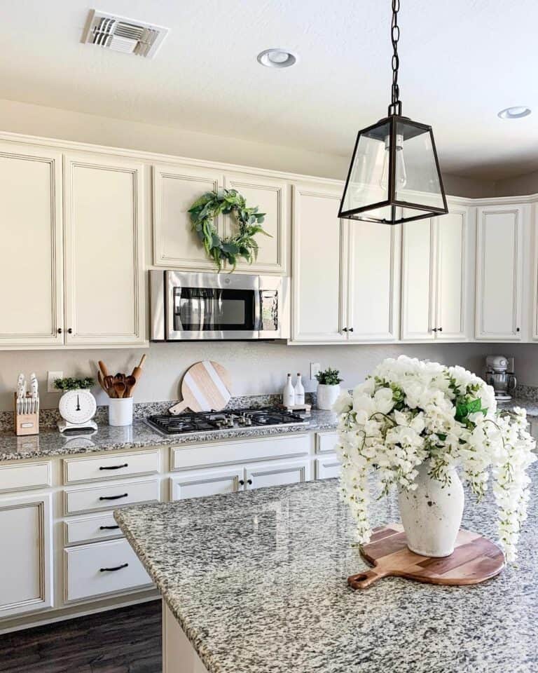 Gray Island Counter With Black Glass Pendant