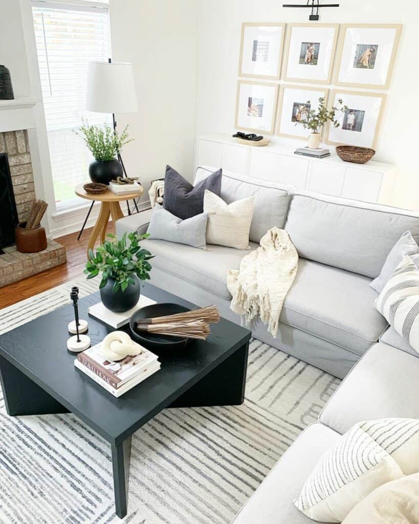 Gray Modular Couch and Large Black Coffee Table