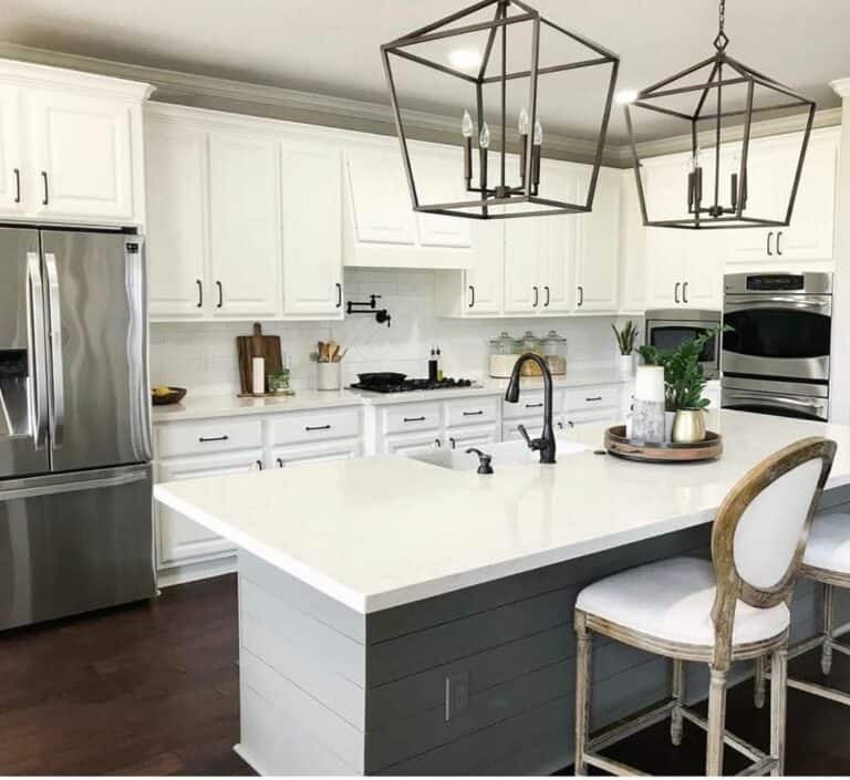 Gray Shiplap Kitchen Island With Black Lantern Pendant Lighting