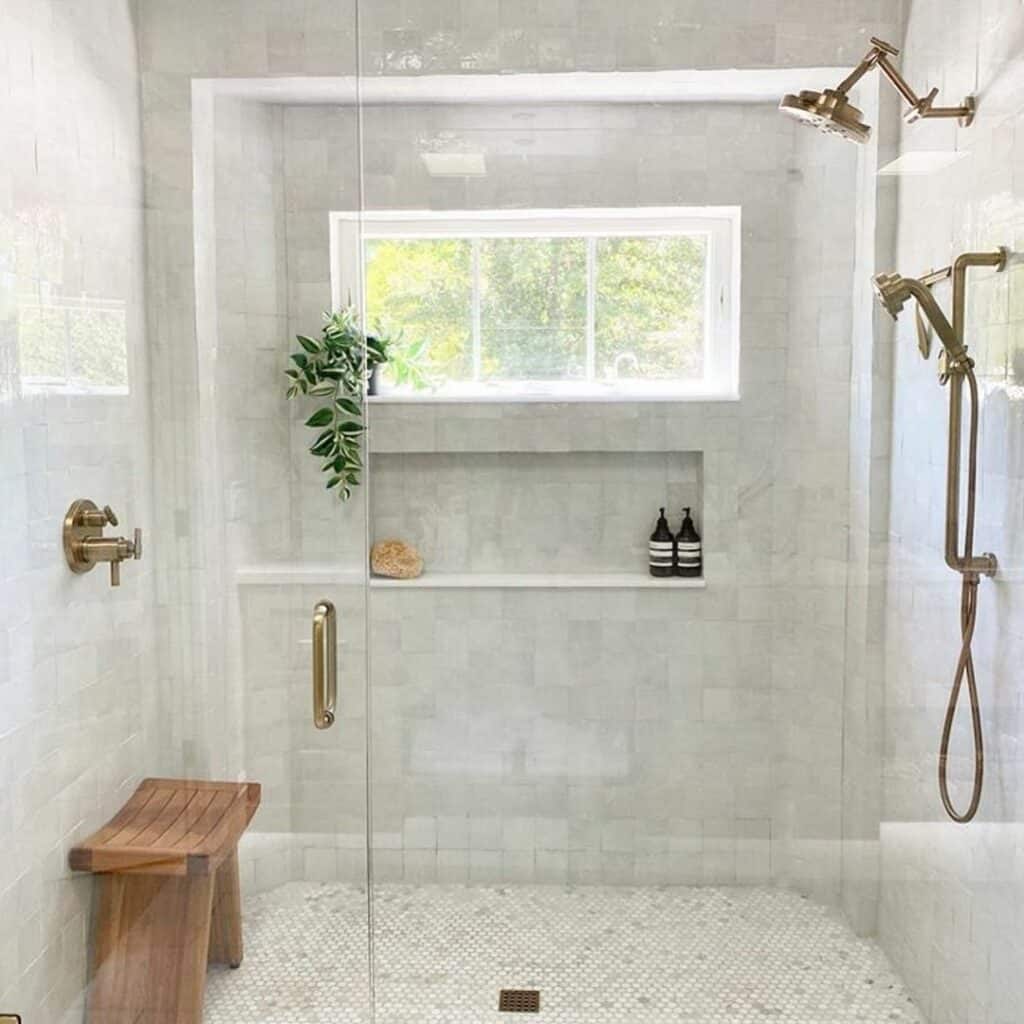 Gray Tile Bathroom with Shower Niche and Window