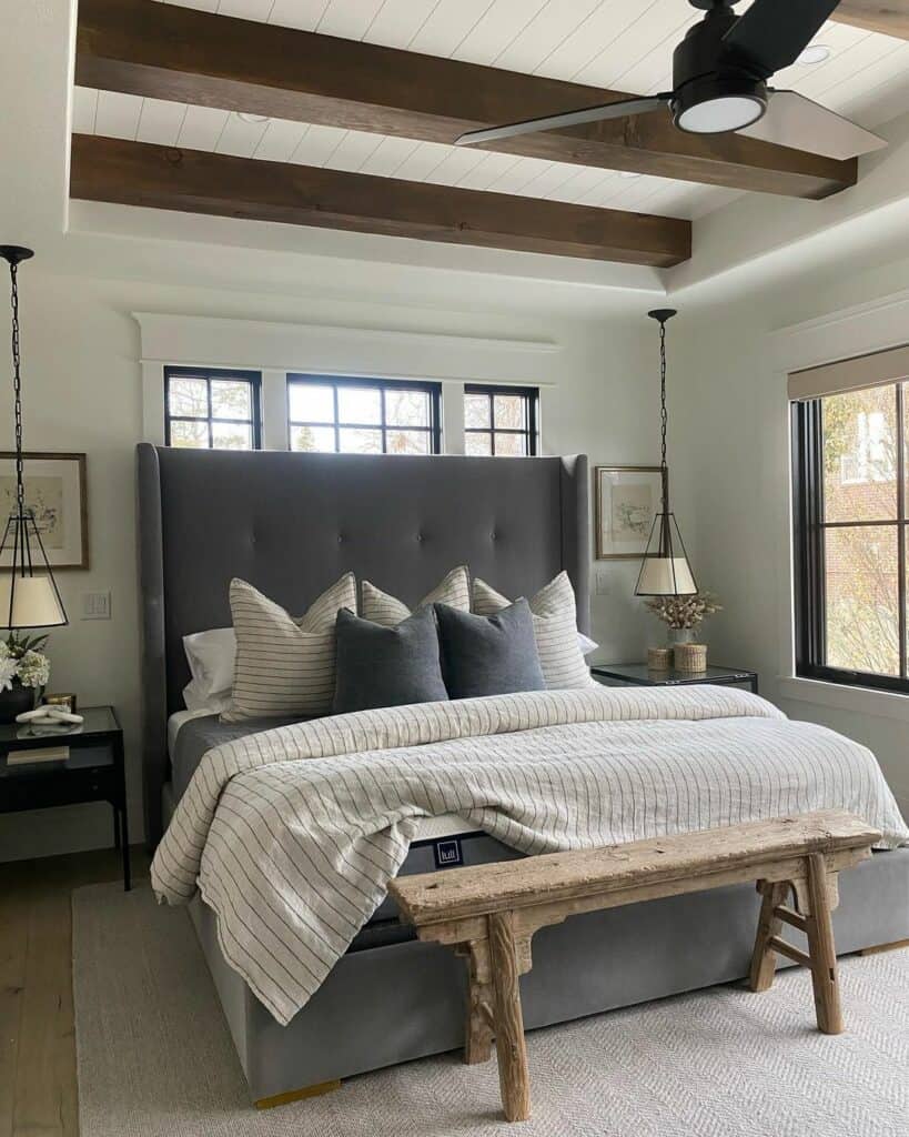 Gray and White Bedroom With Exposed Beam Ceiling