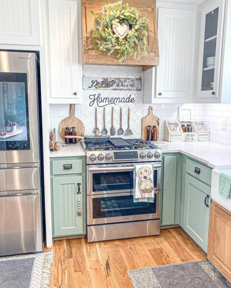 Green Kitchen Cabinets and Herringbone Backsplash