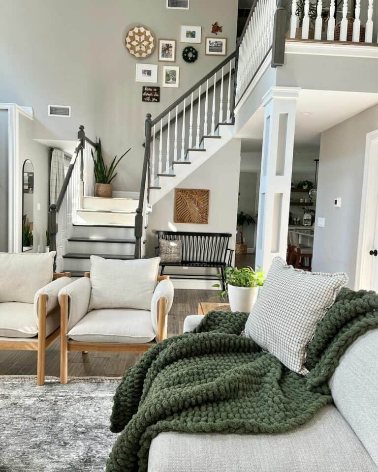 Grey Checkered Pillow on a Green Chunky Knit Blanket Soul & Lane