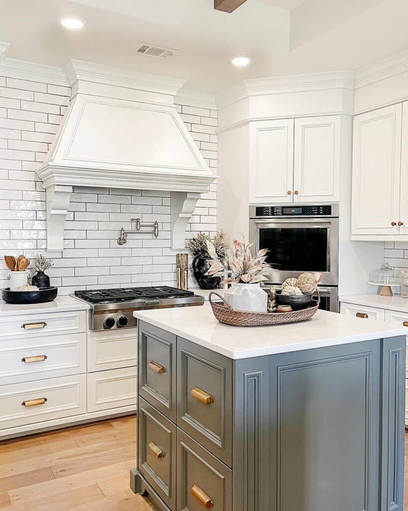 Grey Kitchen Island with Gold Cabinet Hardware