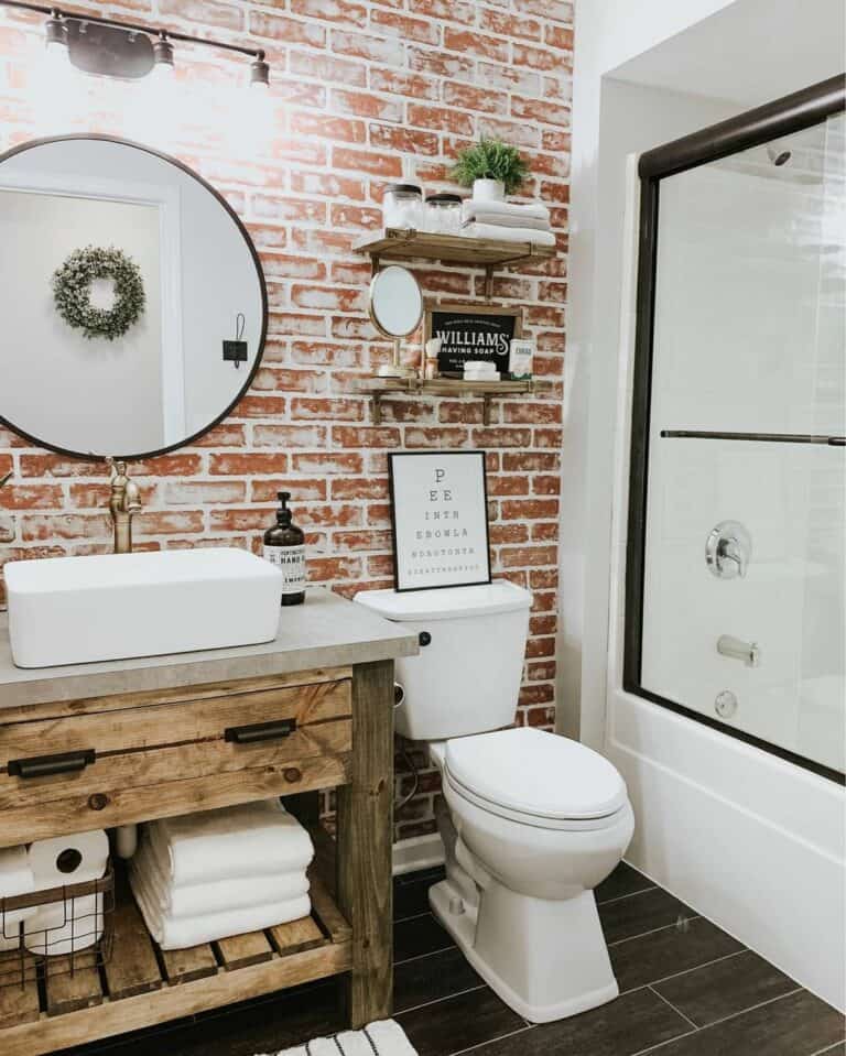 Guest Bath With a Rustic Brick Accent Wall