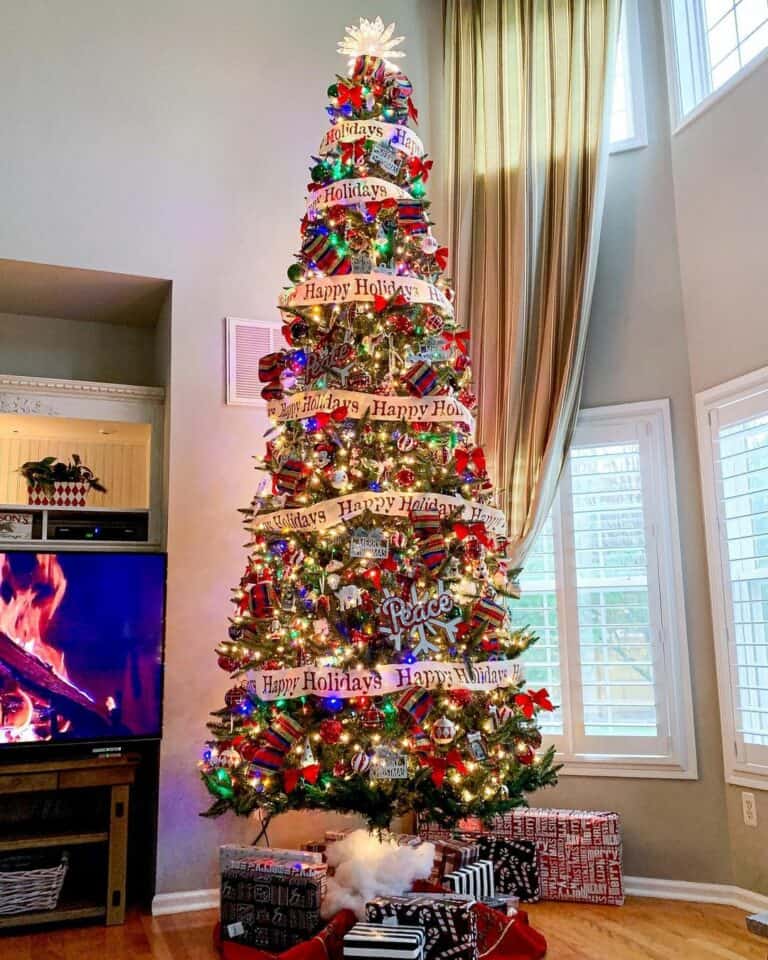 Happy Holidays Ribbon Garland on Large Christmas Tree