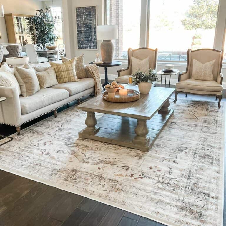 Heavy Beige Lamp on a Round Black End Table