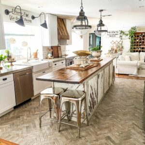 Herringbone Tile Flanked by Stained Wood Flooring