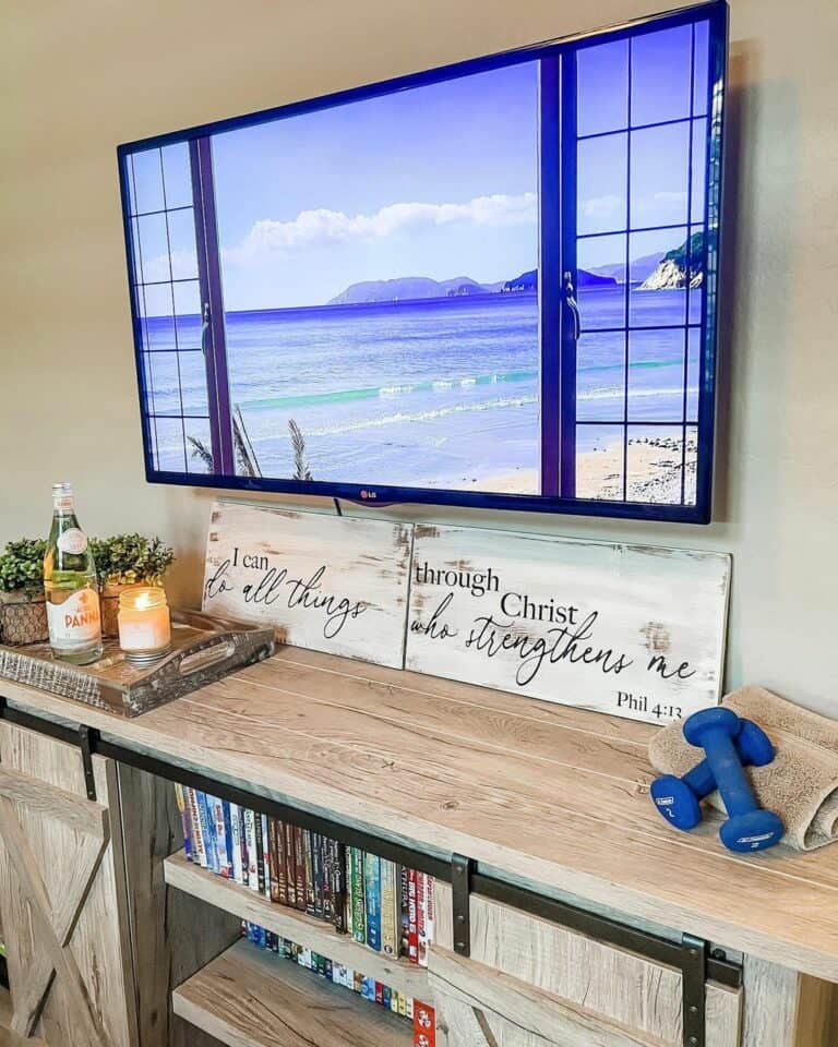 Large TV and Rustic Entertainment Center