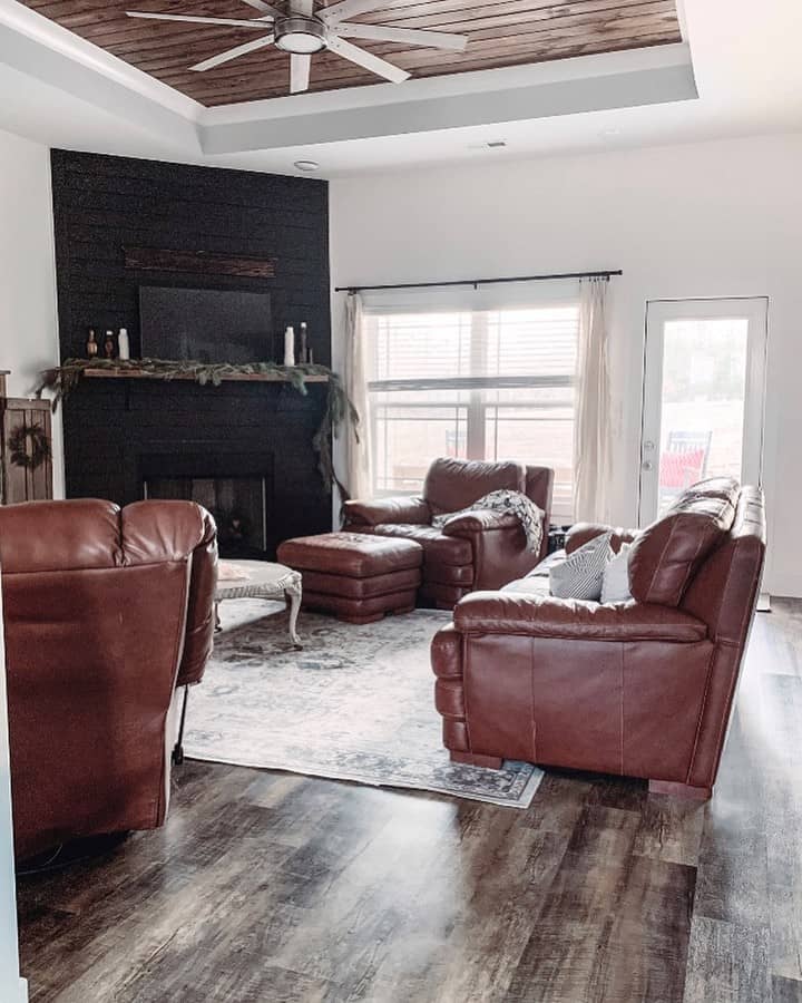 Leather Furniture With Black Shiplap Fireplace