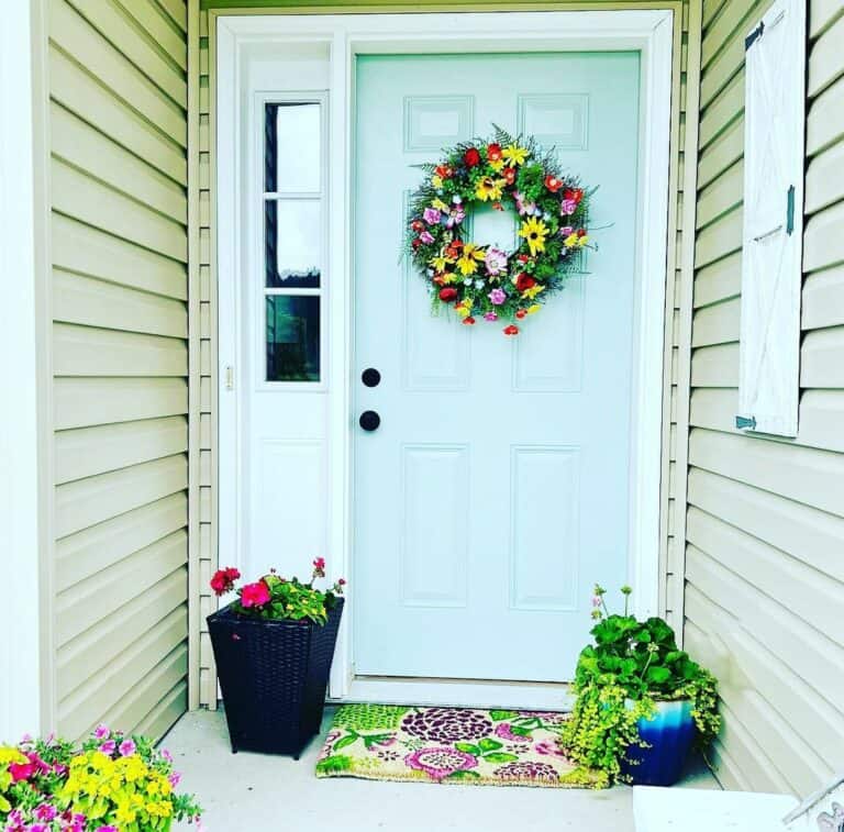 Light Blue Door with Colorful Floral Summer Wreath