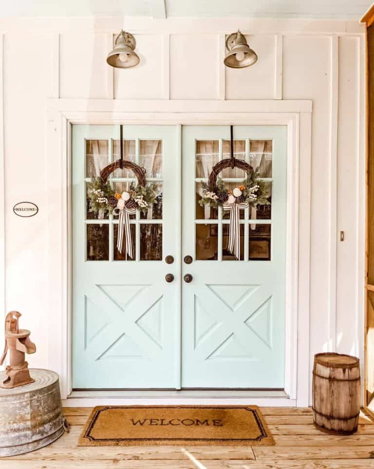 Light Blue Double Doors With Wreaths