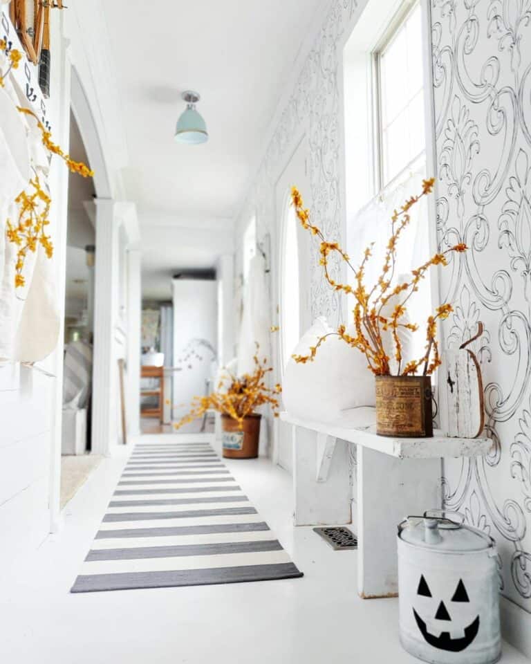 Light Blue Hallway Chandelier and Whimsical Wallpaper