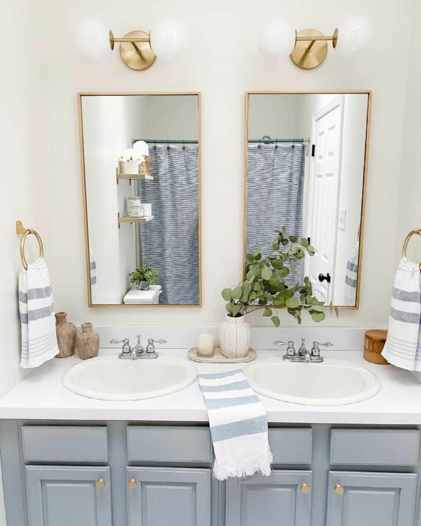 Light Blue and Gold Bathroom with Double Vanity