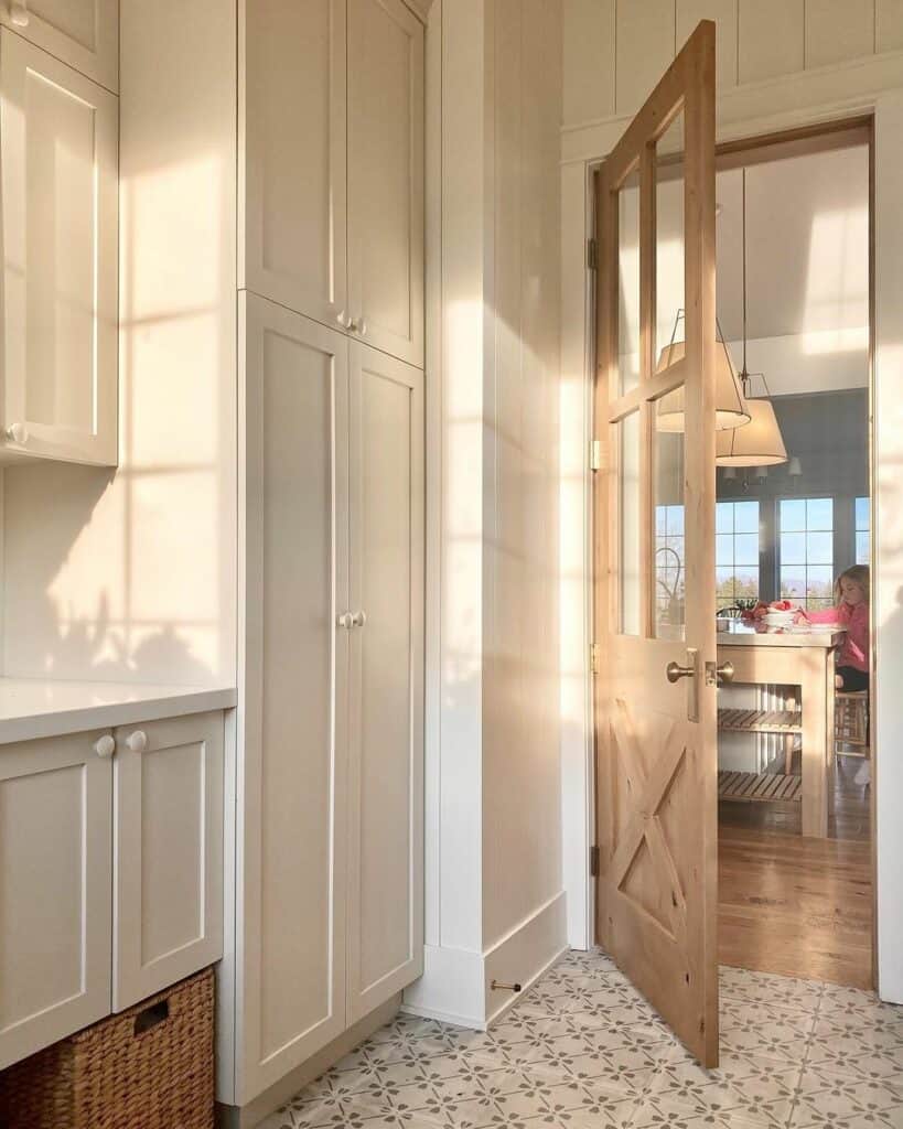 Light-Colored Patterned Tile in a White Entryway