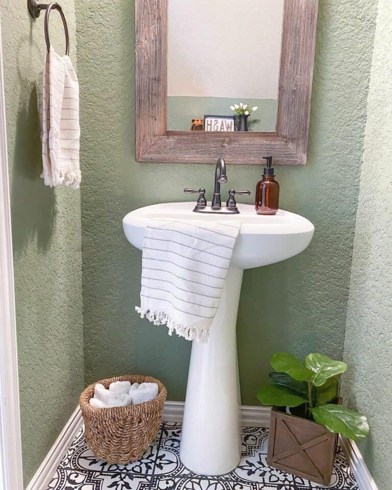 Light Green Bathroom with Patterned Floor