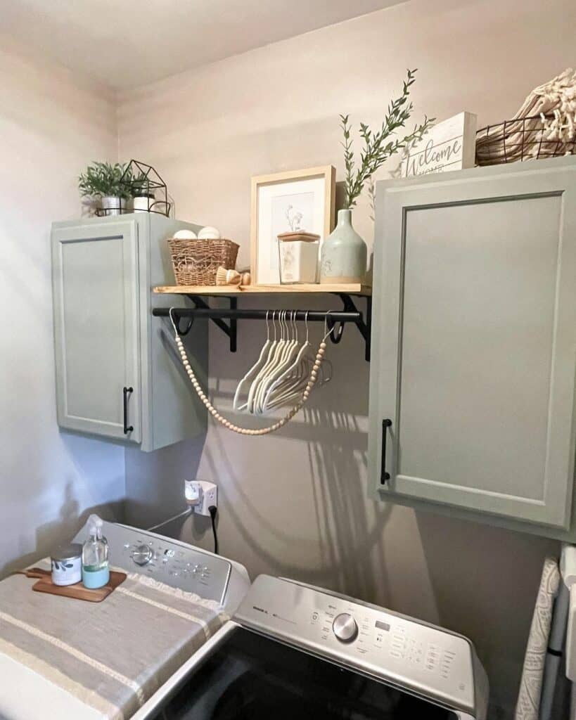Light Green Cabinets for Storage in Small Laundry Room