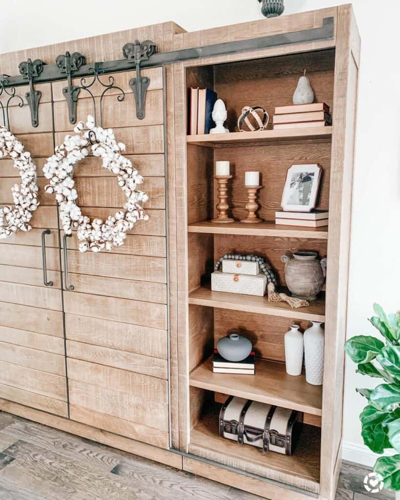 Light Wood Media Unit with Cotton Wreaths