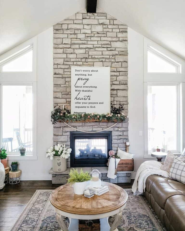 Living Room Table in Front of a Fireplace Wall