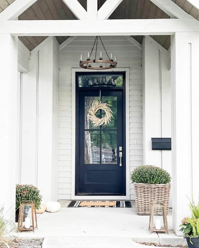 Matte Black Door with Wreath on Modern Front Porch